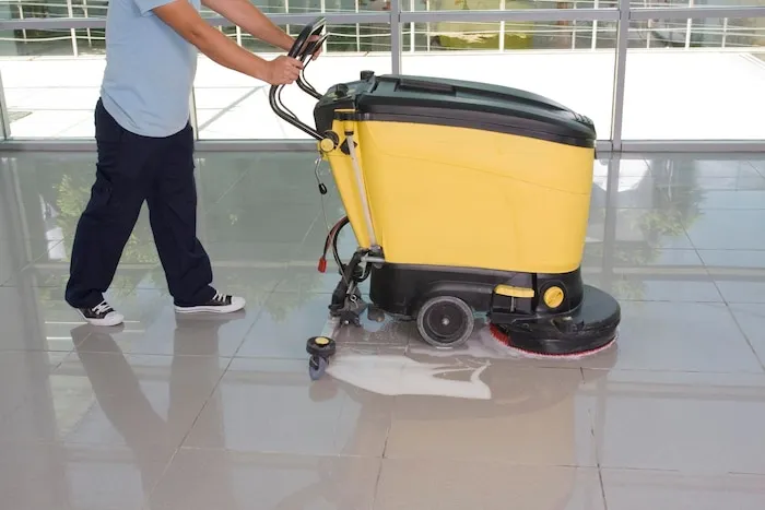 man-worker-cleaning-floor